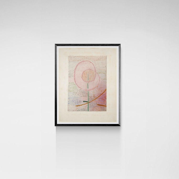 Framed abstract artwork on a white wall