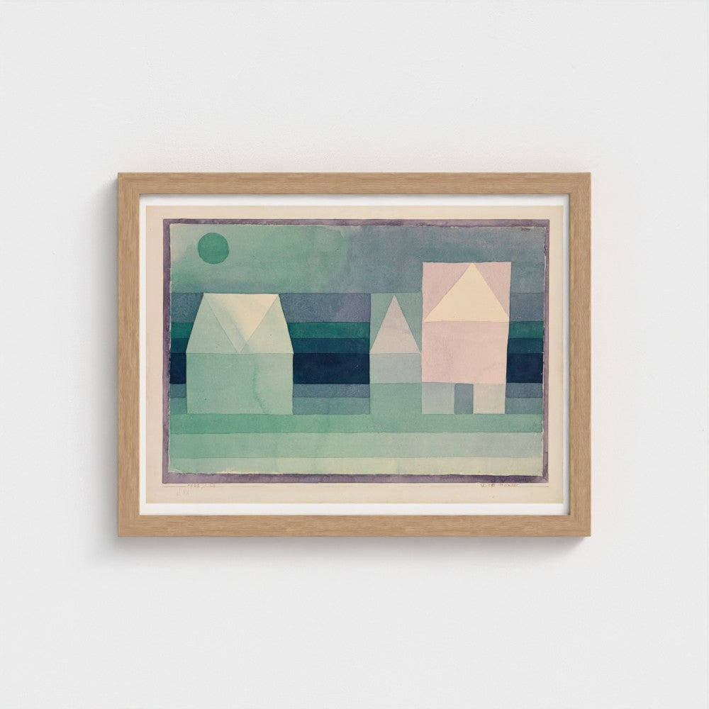 Framed abstract artwork with geometric shapes on a white wall