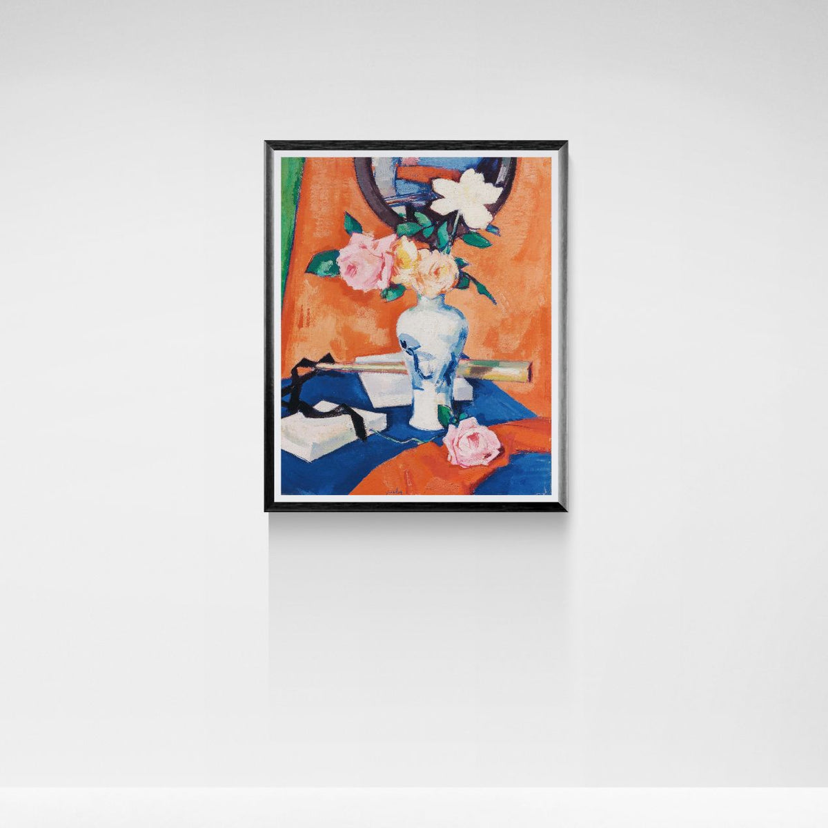 Framed painting of a still life scene with flowers and a vase on a white wall.