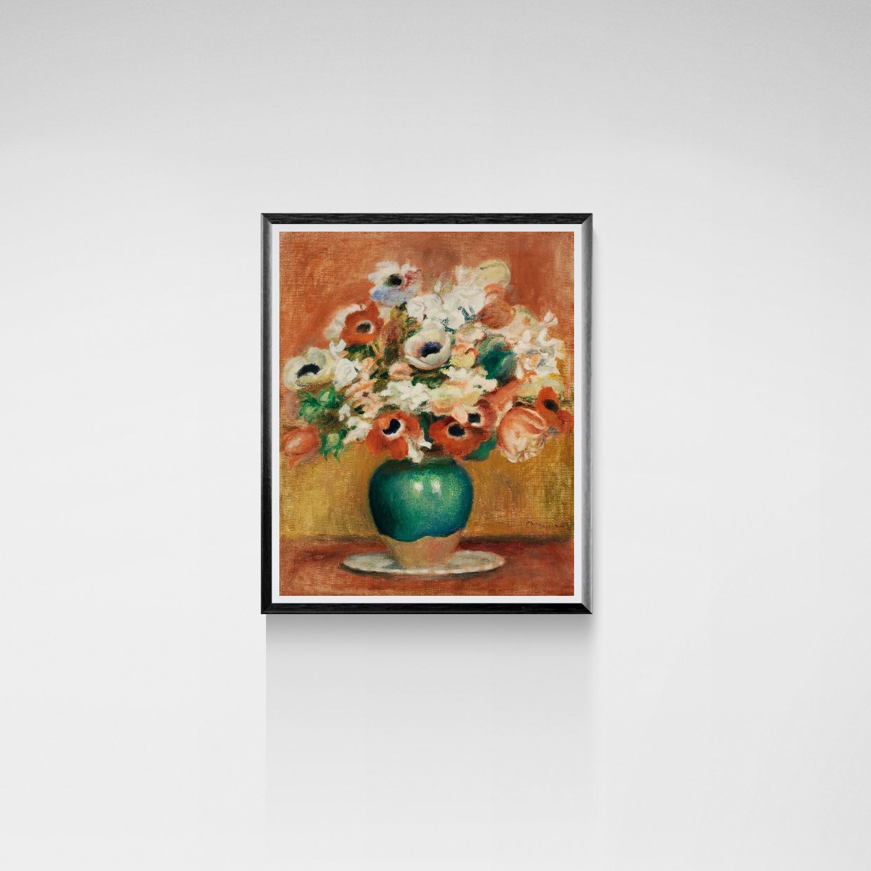Framed artwork of a floral arrangement in a green vase on a white wall.