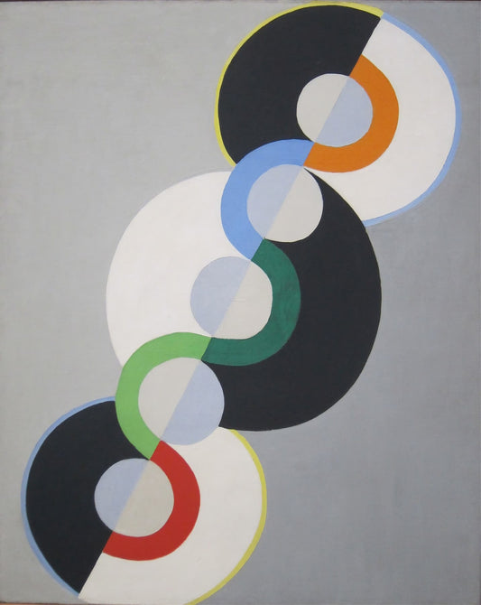 Abstract art piece with interlocking colored circles on a gray background