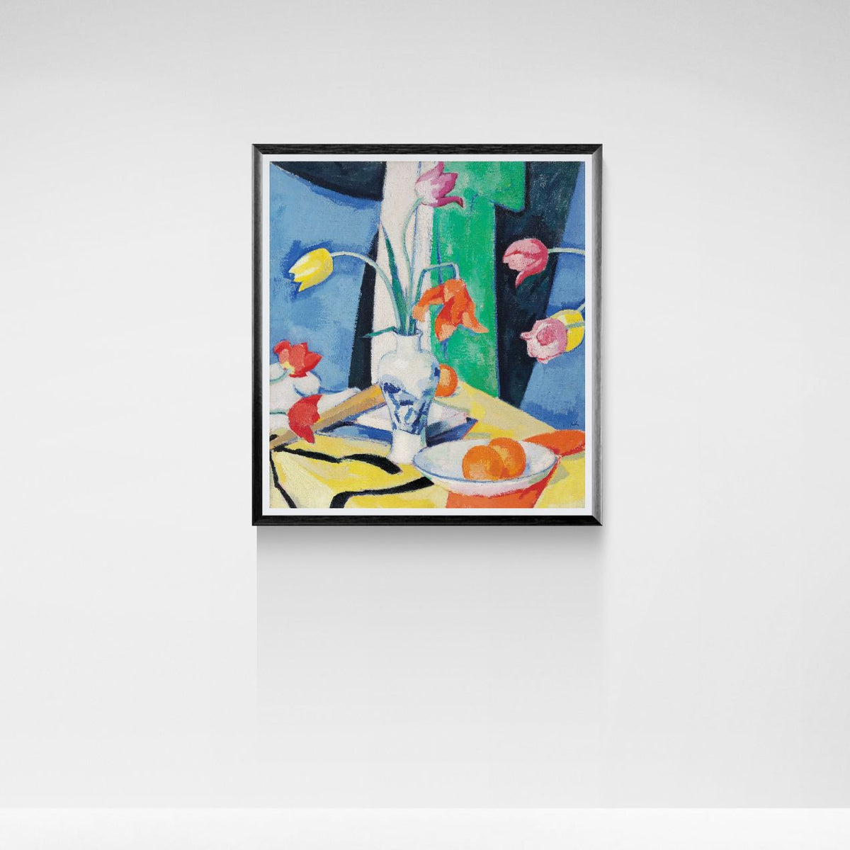 Framed painting of a still life scene with flowers and fruit on a white wall.