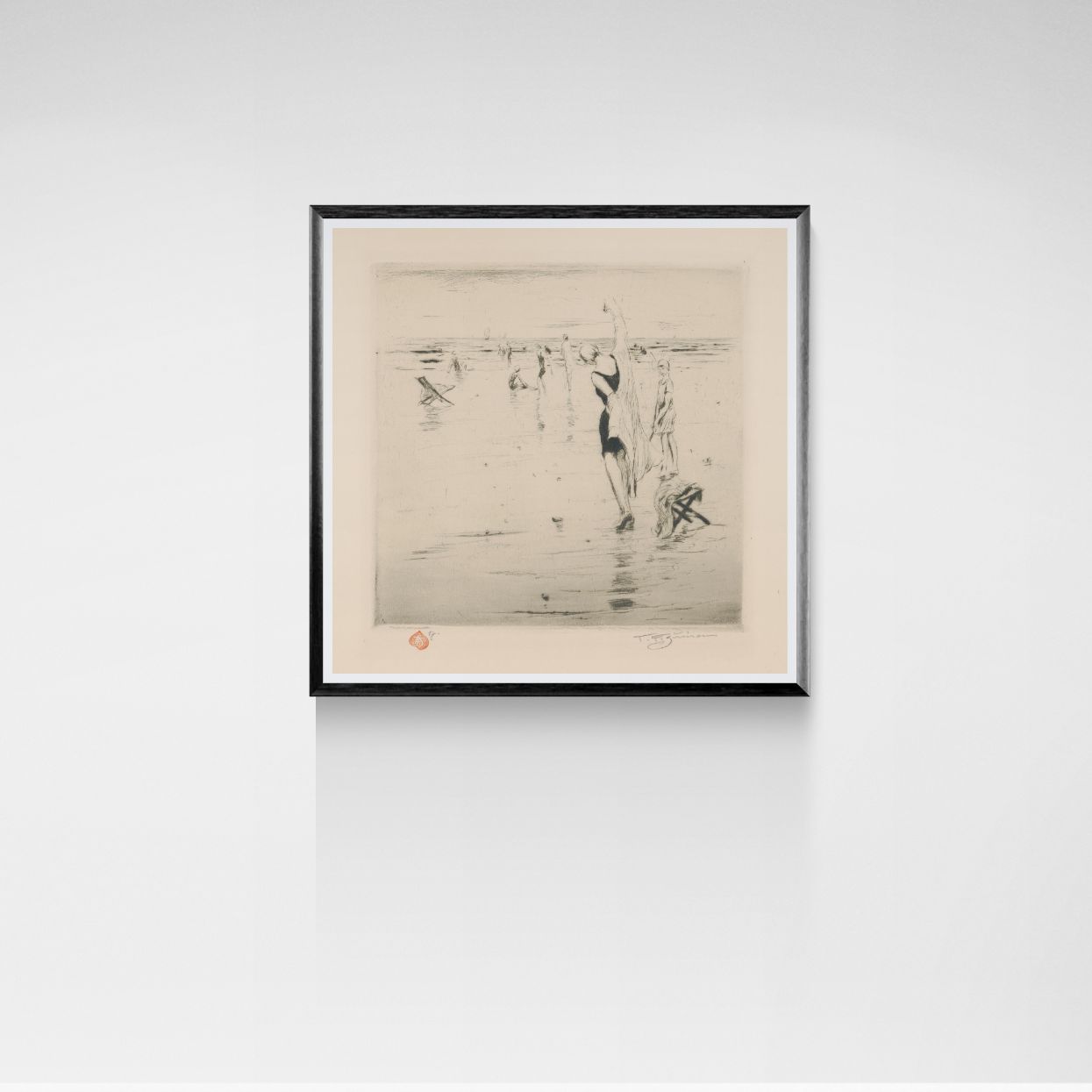 Framed seaside artwork on a white wall