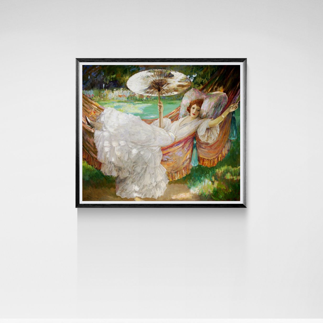 Framed painting of a woman in a white dress sitting in a hammock with an umbrella on a white wall.