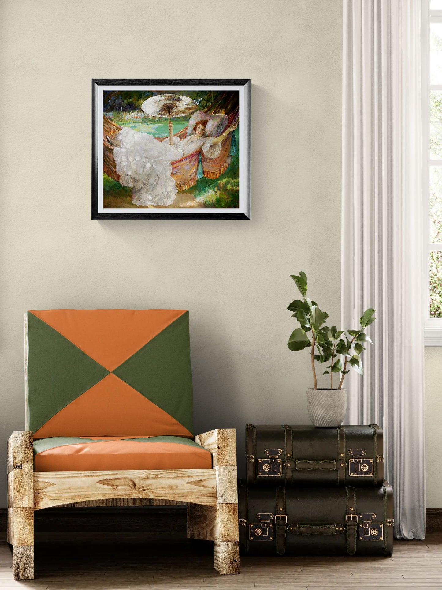 Framed painting on a wall above a colorful chair with a suitcase and plant in the room.