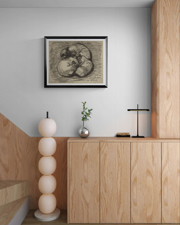 Modern interior with wooden cabinets, a framed artwork, and decorative items.
