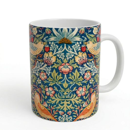 Mug with floral and bird pattern on a white background