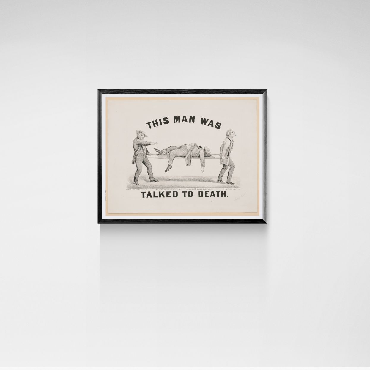 Framed print with a humorous illustration and text on a white wall