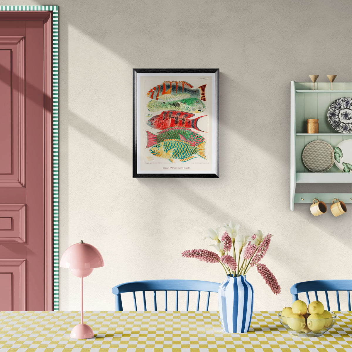 Dining room with a framed artwork of fish, a pink lamp, blue chairs, and a checkered tablecloth.