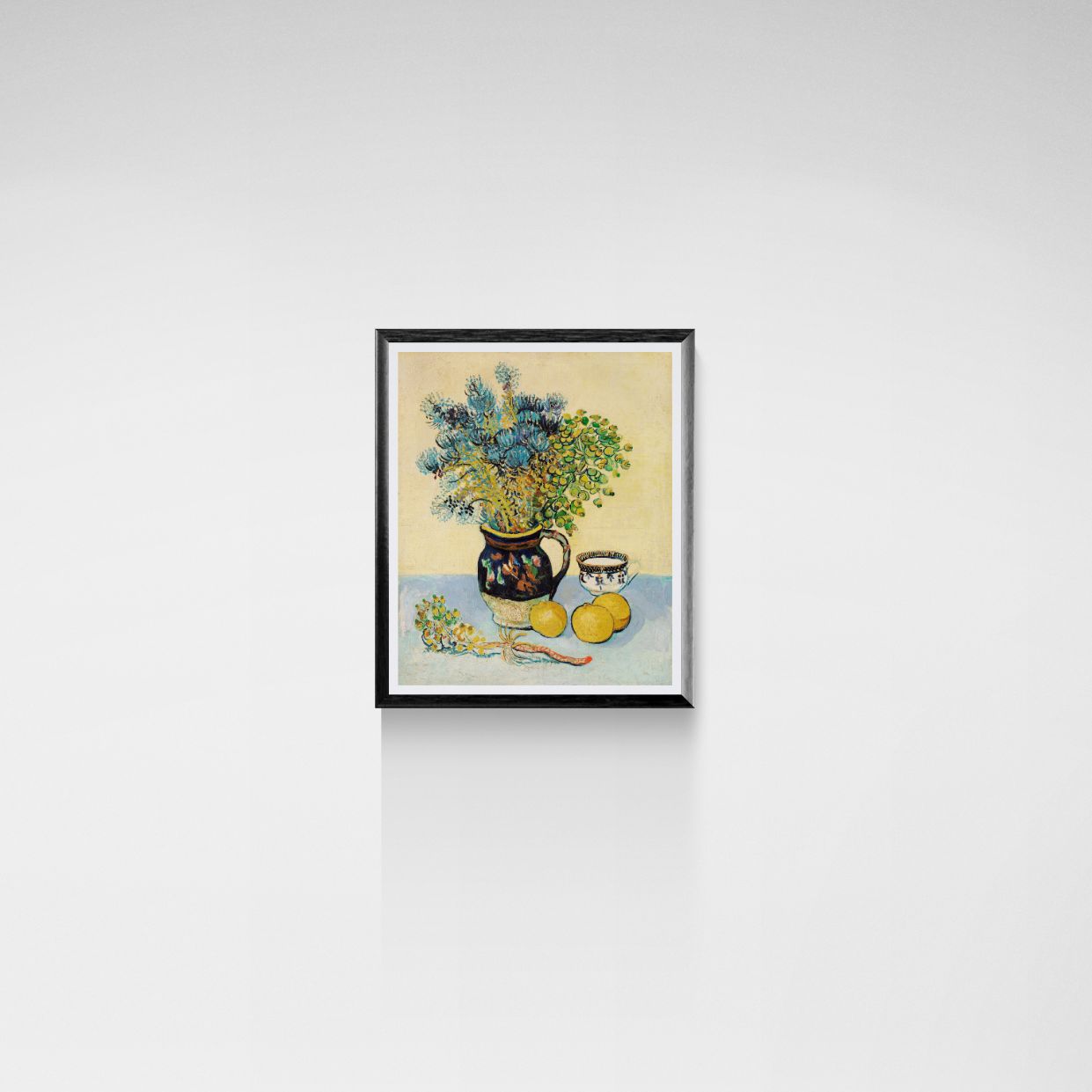 Framed artwork of a still life with flowers and fruits on a white wall.