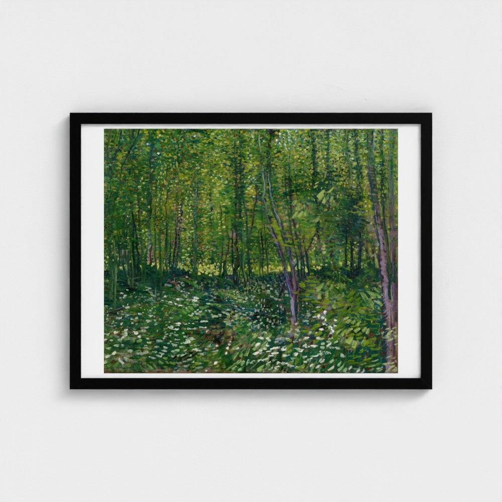 Framed artwork of 'Starry Night' by Vincent van Gogh on a white wall.