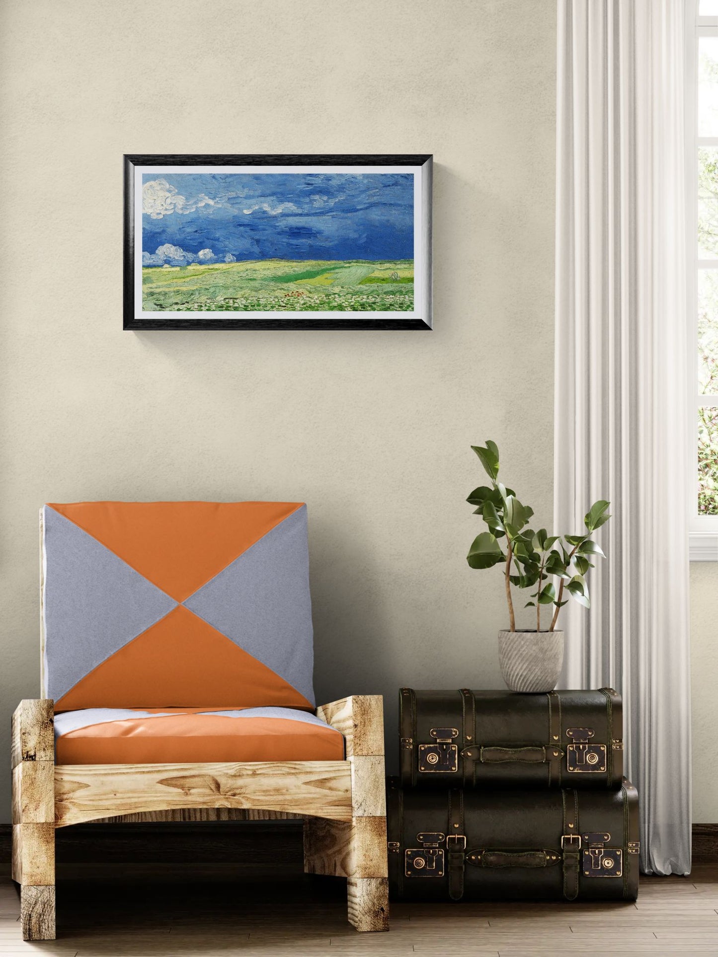 Chair with geometric patterned backrest in a room with a painting on the wall and a suitcase on the floor.