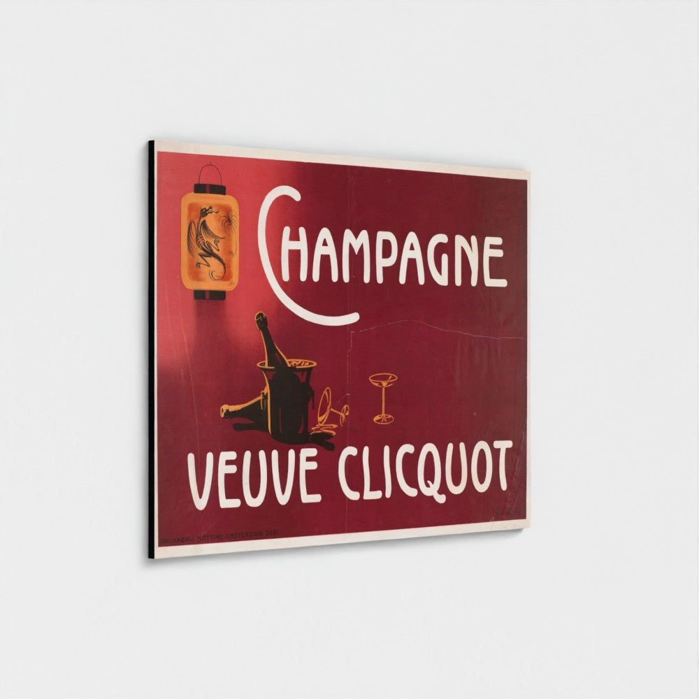A square vintage-style wall art print featuring a burgundy red background with white text reading 'CHAMPAGNE' and 'VEUVE CLICQUOT,' plus illustrated elements including a bottle, ice bucket, and glass. The print is shown at a slight angle against a light gray background.
