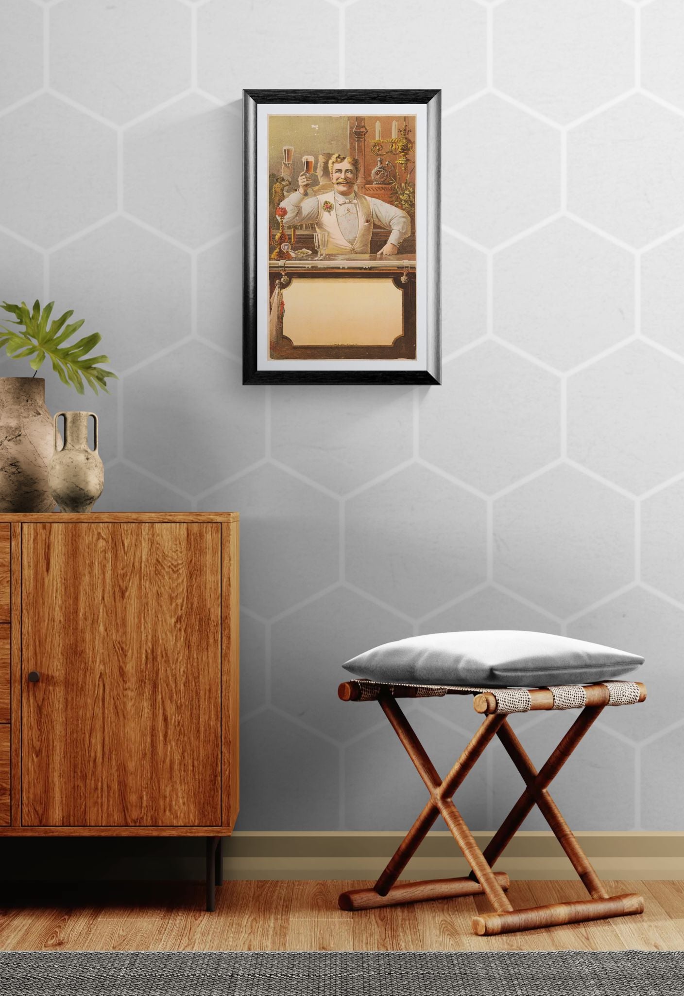 Room interior with wooden cabinet, plant, and framed picture on hexagonal tiled wall.
