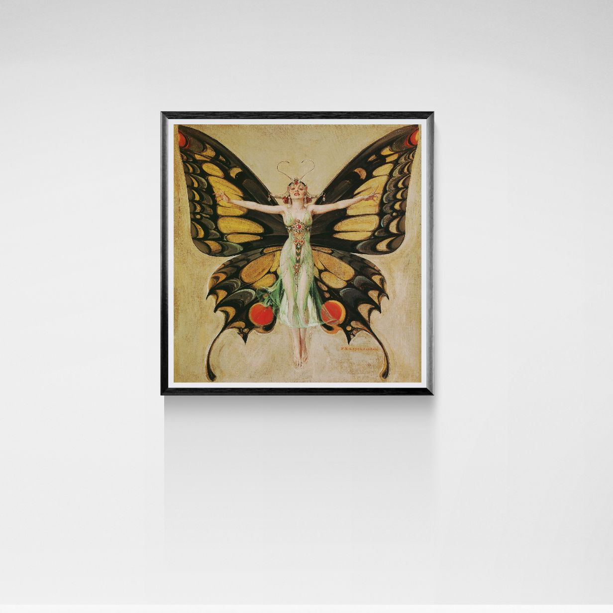 Framed artwork of a woman with butterfly wings on a white wall