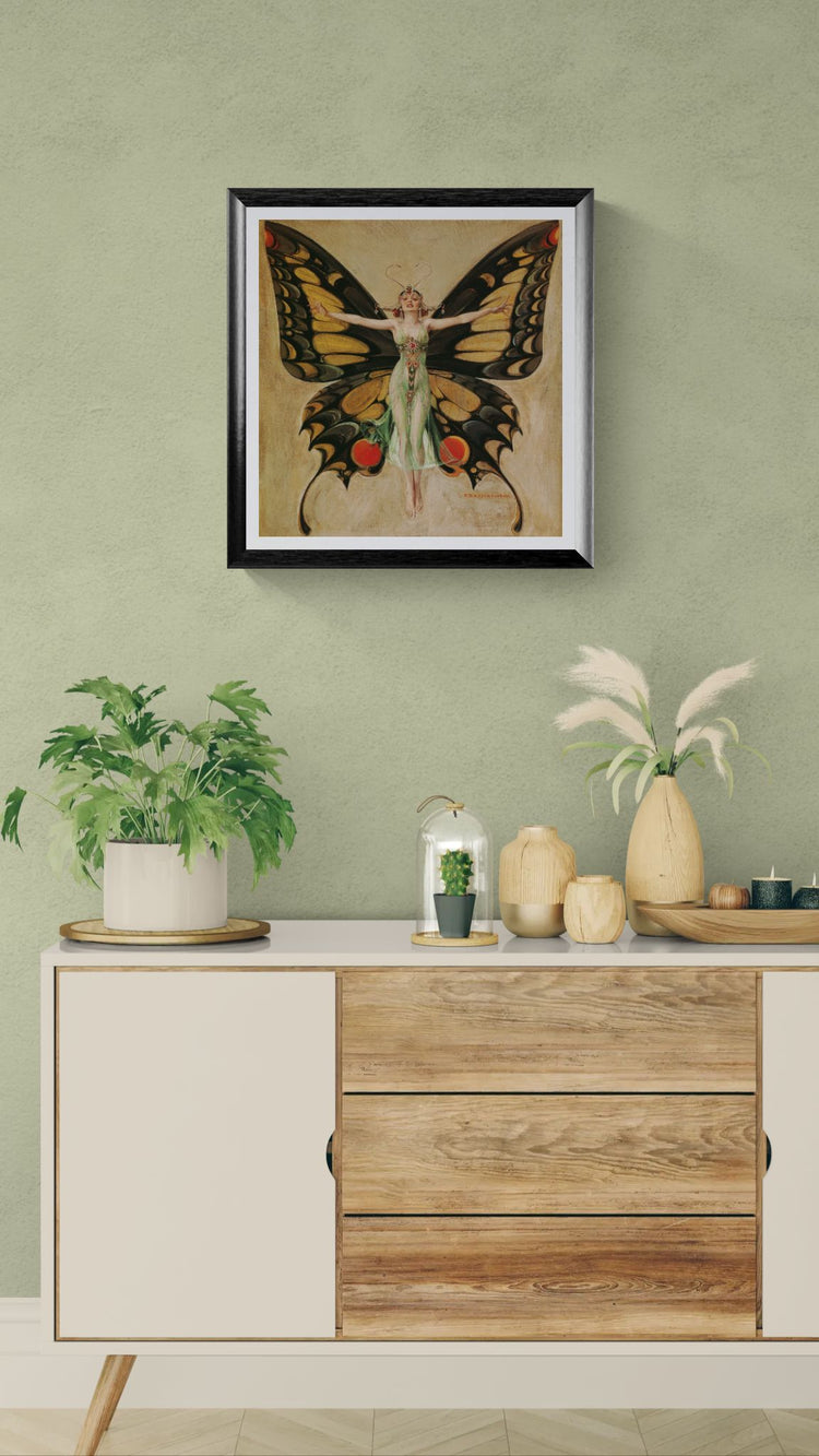 Framed butterfly artwork above a wooden cabinet with decorative items.