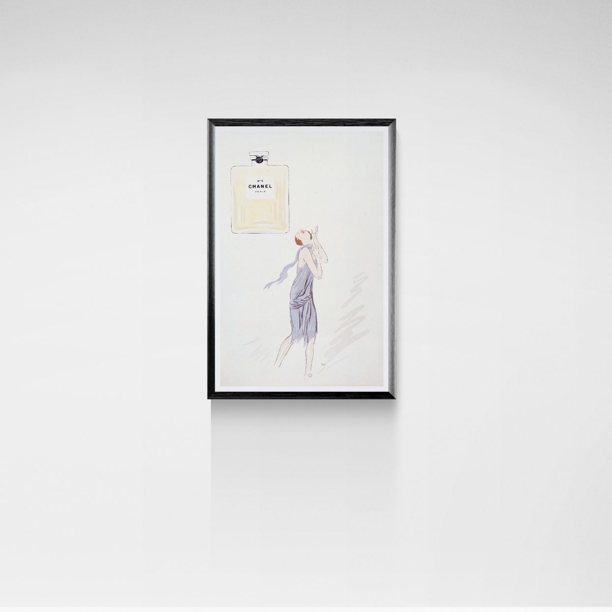 Framed artwork of a woman in a dress on a white wall