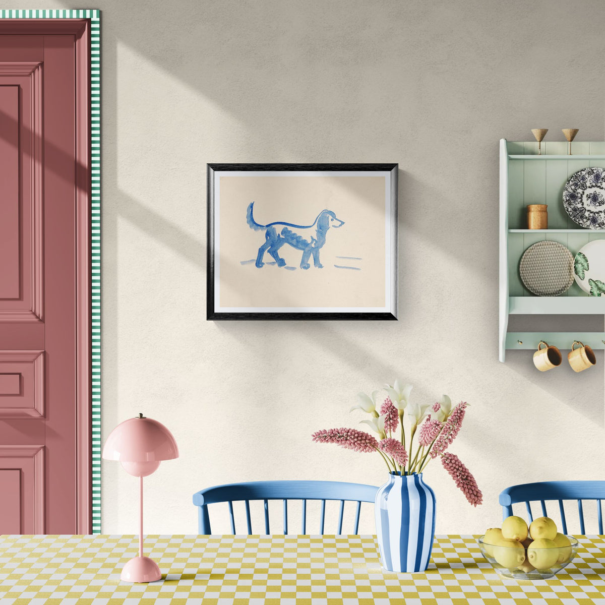 Dining room with a framed picture of a dog, pink lamp, and checkered tablecloth.