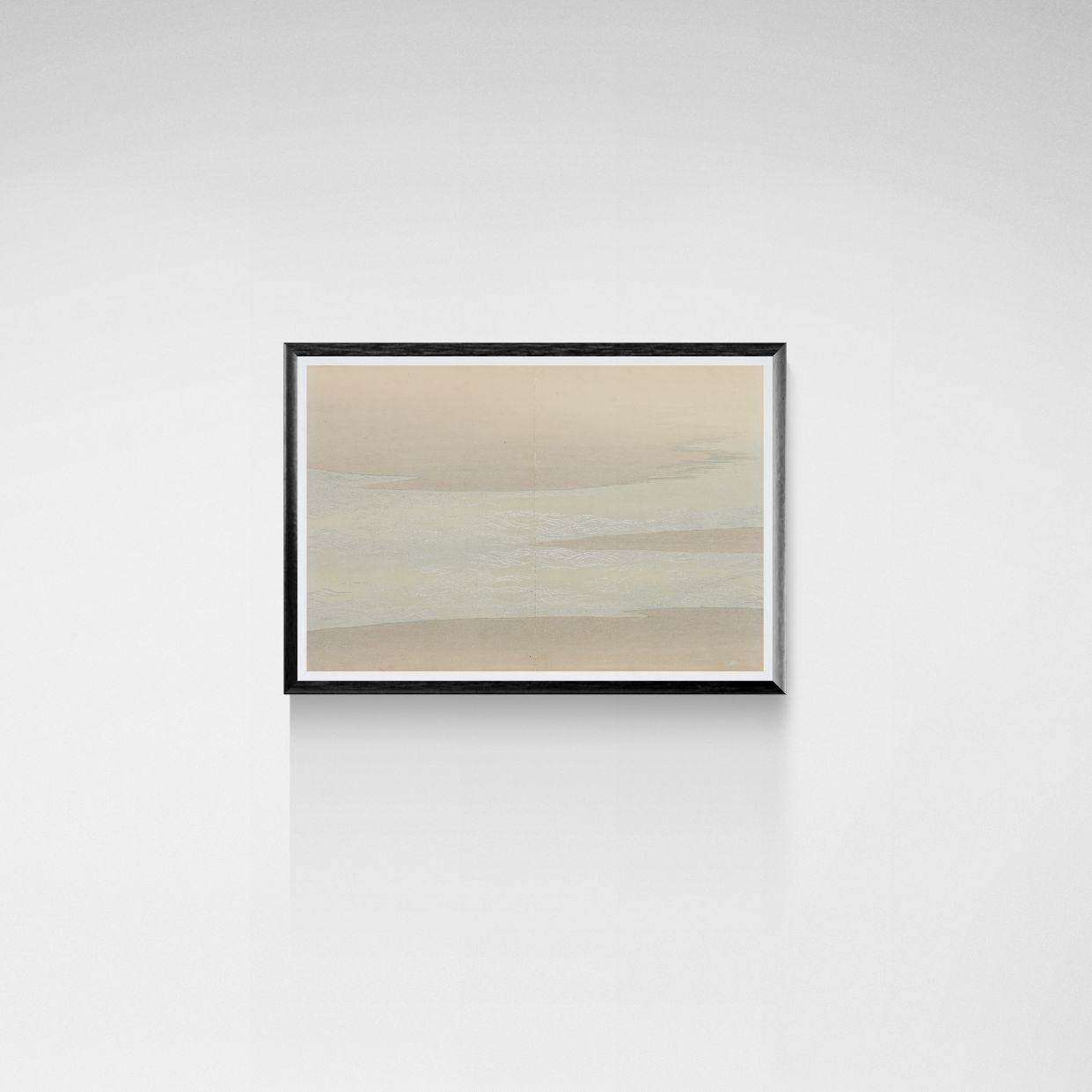 Framed abstract painting on a white wall