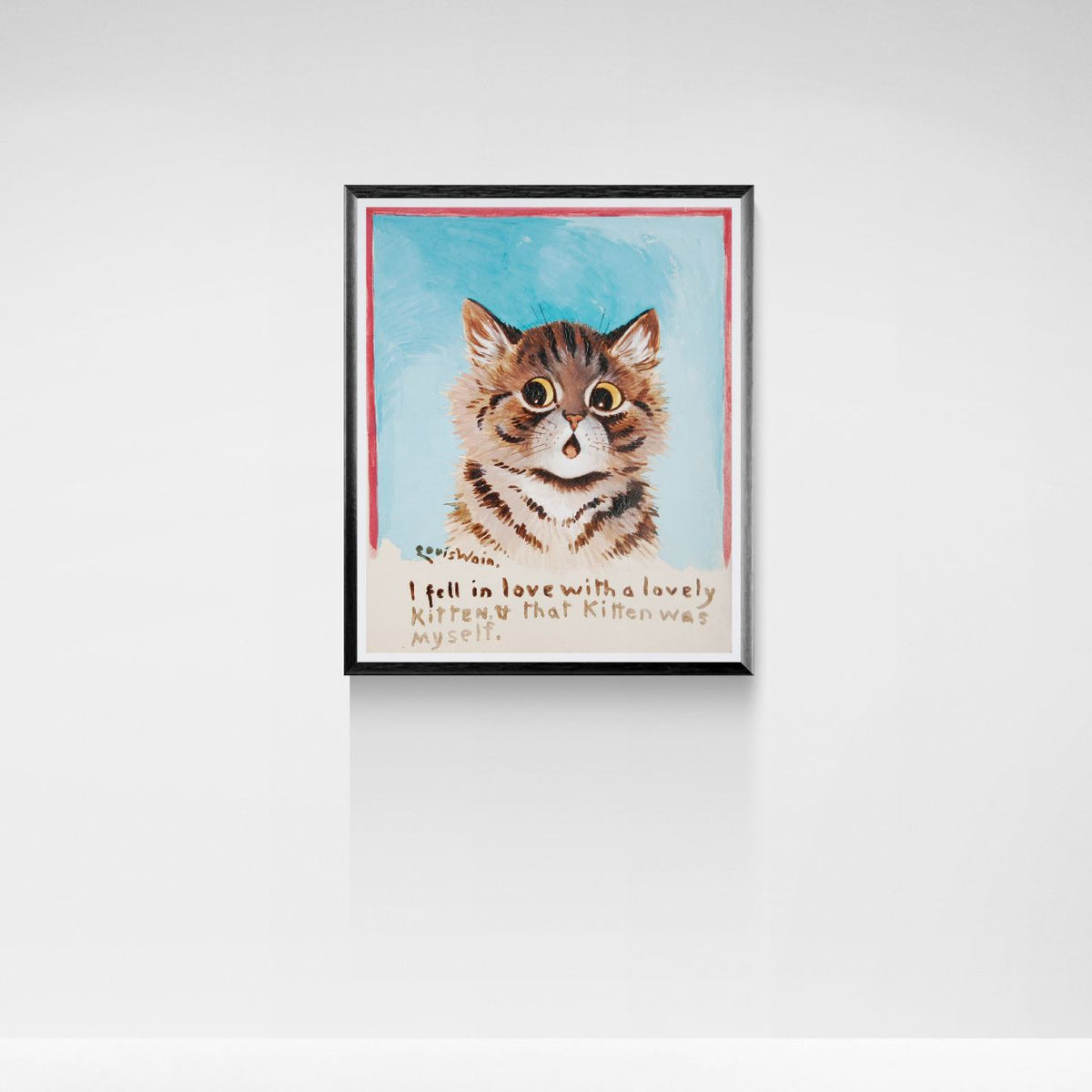 Framed artwork of a cat with text on a white wall