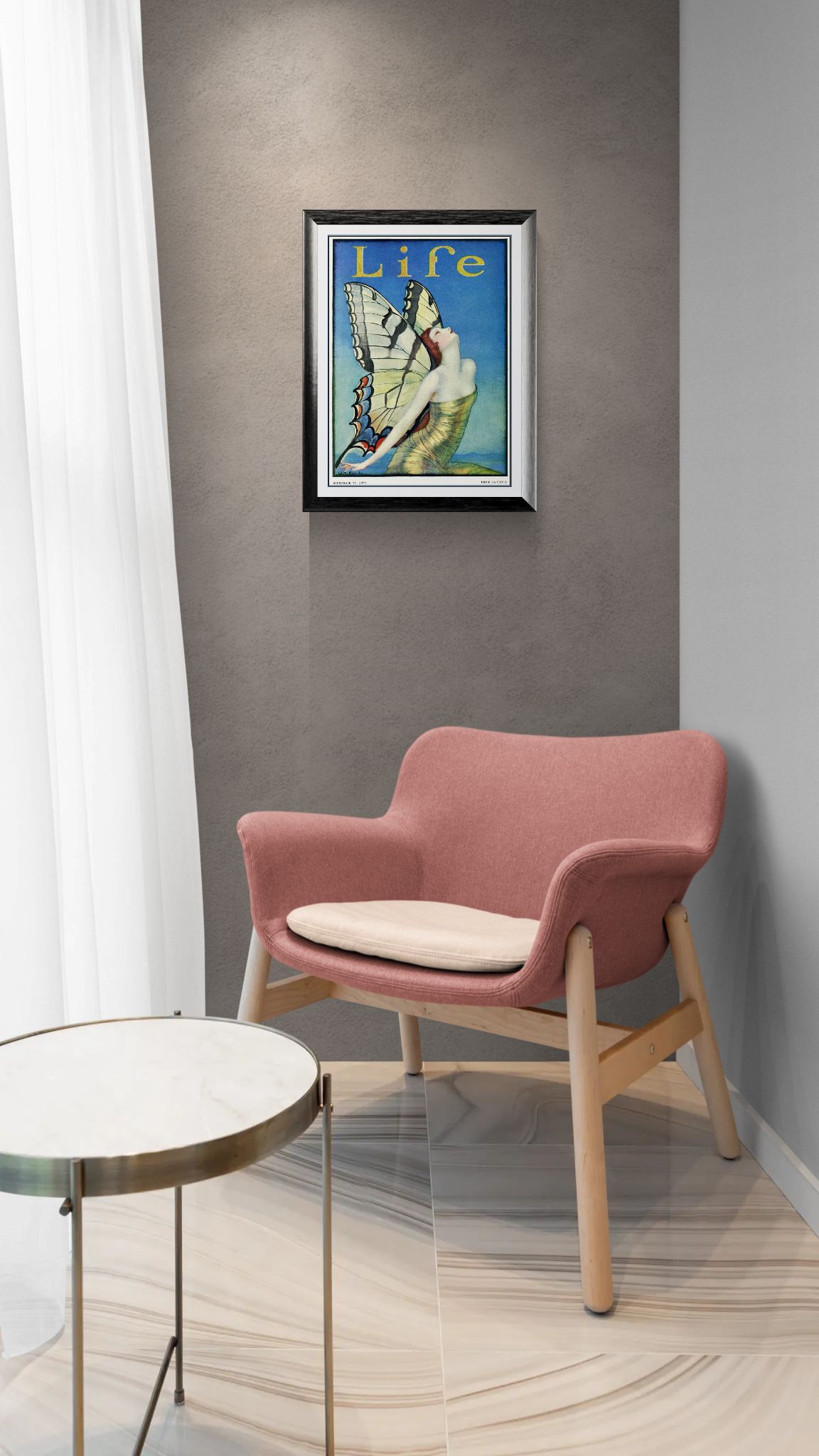 Pink chair with a beige cushion in a room with a framed picture on the wall.