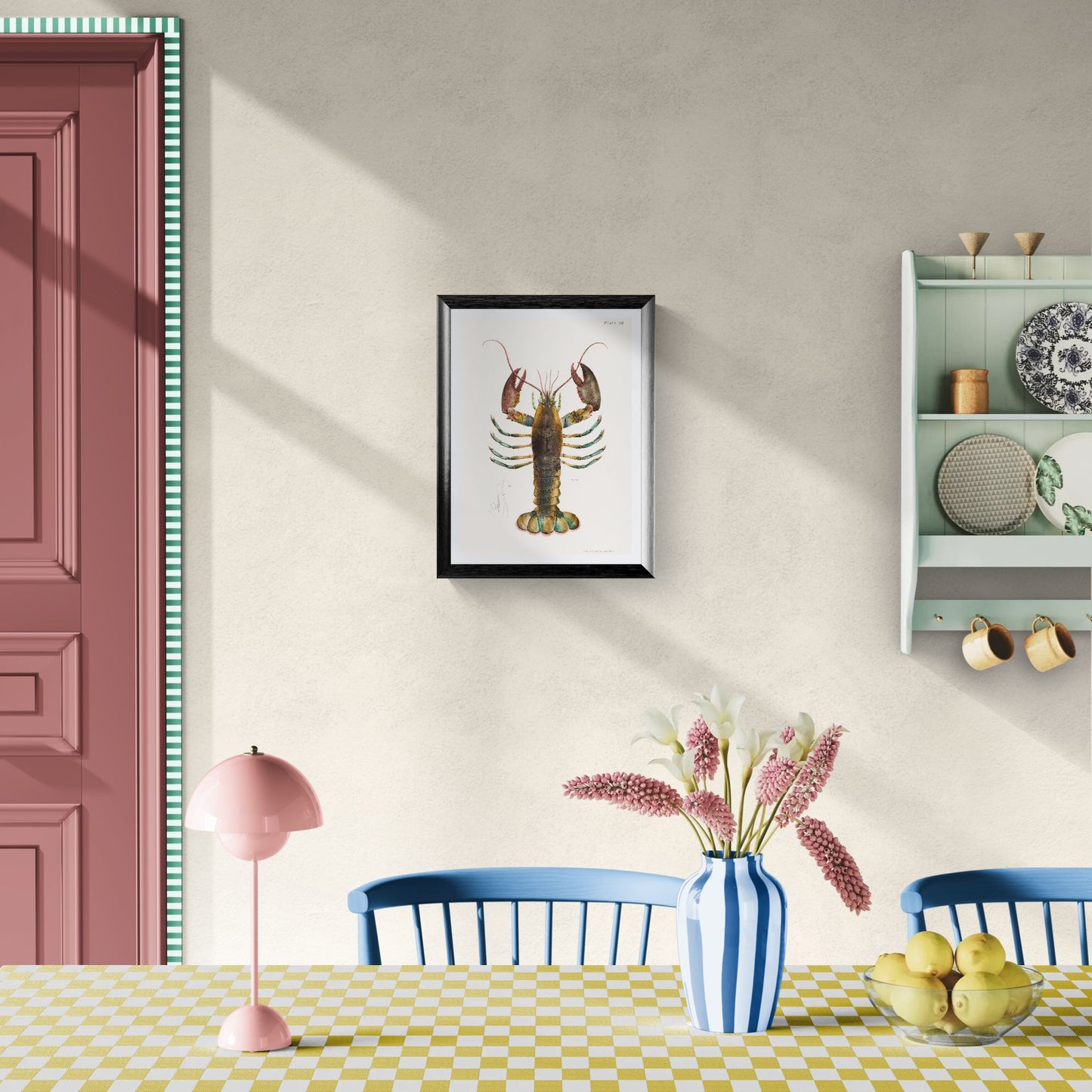 Dining room with a lobster print on the wall, pink lamp, blue chairs, and checkered tablecloth.