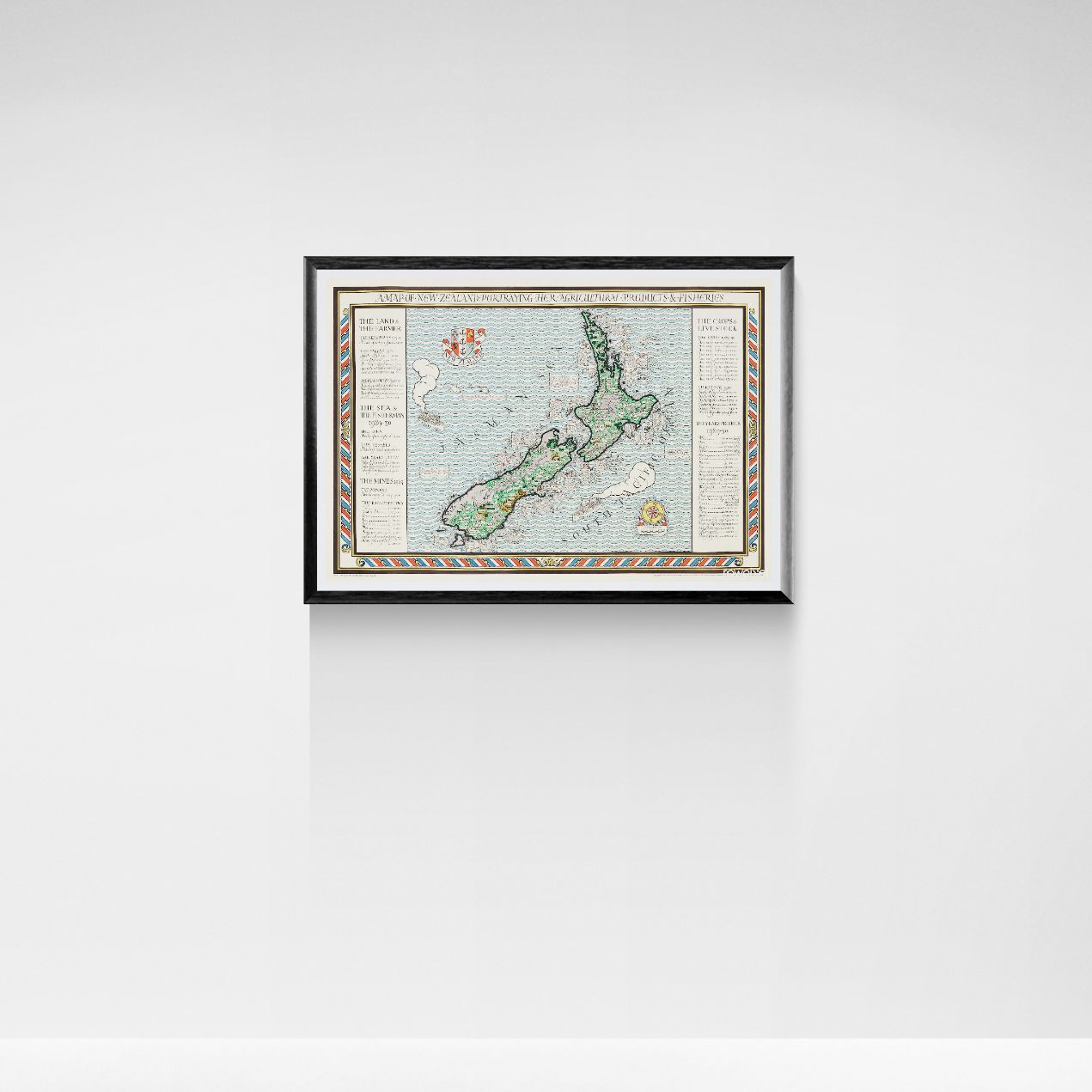 Framed map of New Zealand on a white wall