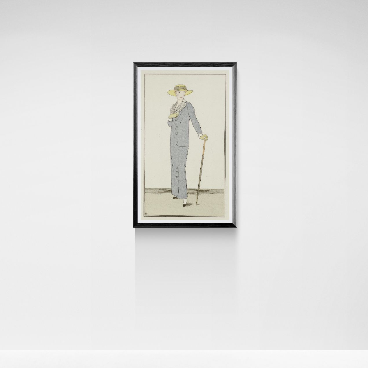 Framed artwork of a woman in a suit with a hat and cane on a white wall.