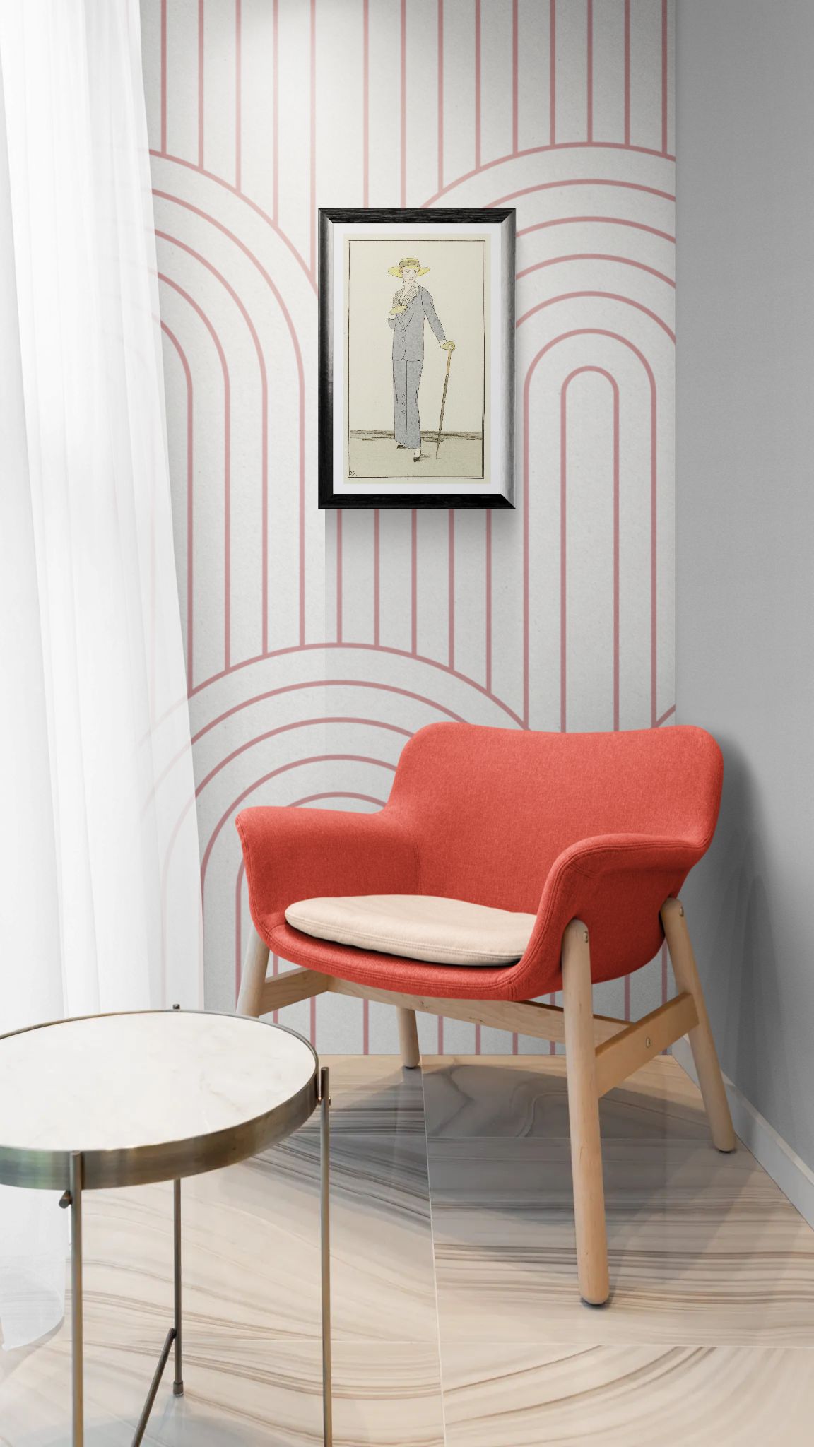Red armchair with a white cushion in a room with geometric wall patterns.