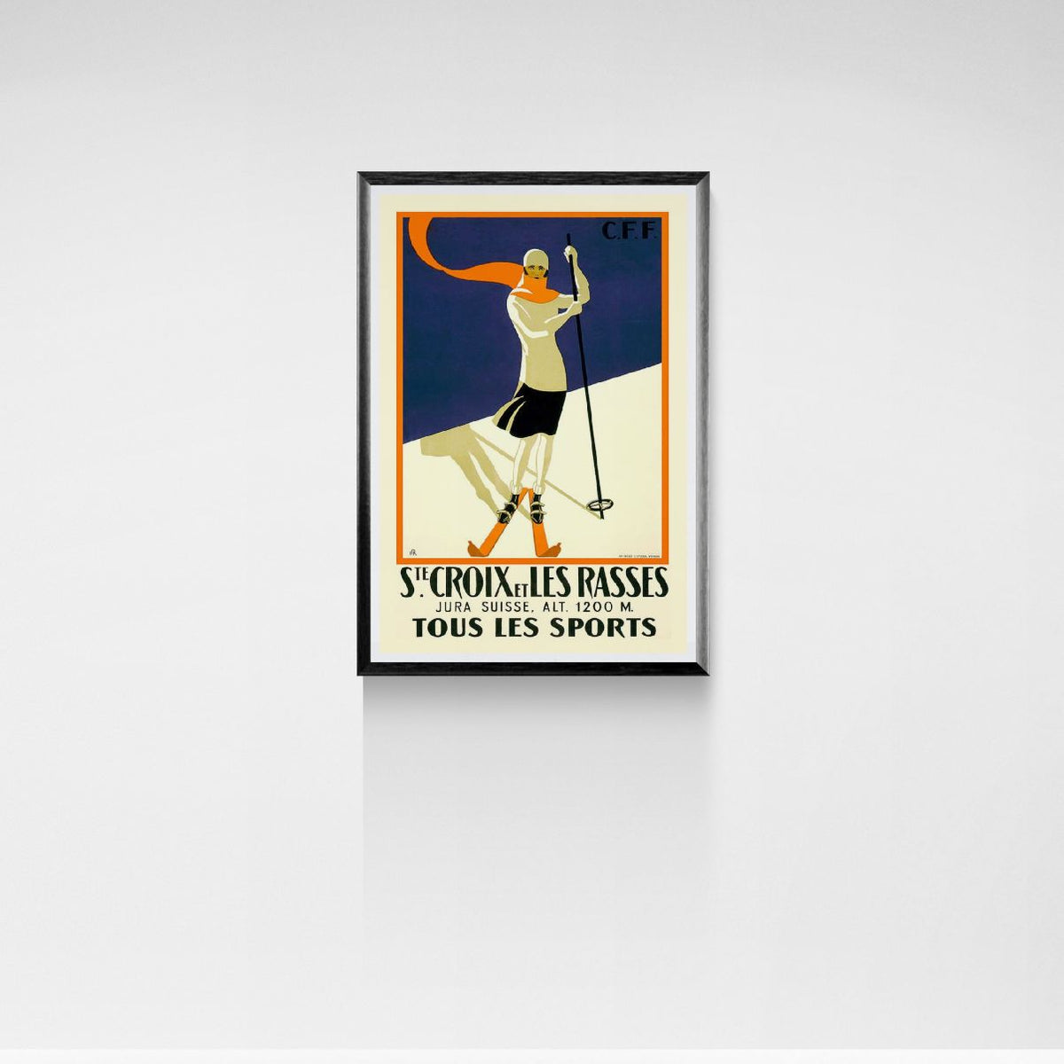 Framed vintage-style poster of a skier with text on a white background