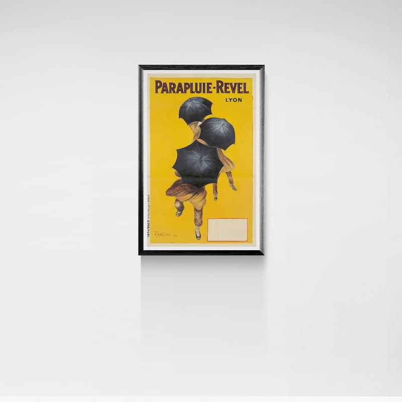 Vintage-style poster of a woman with black umbrellas on a yellow background, framed against a white wall.
