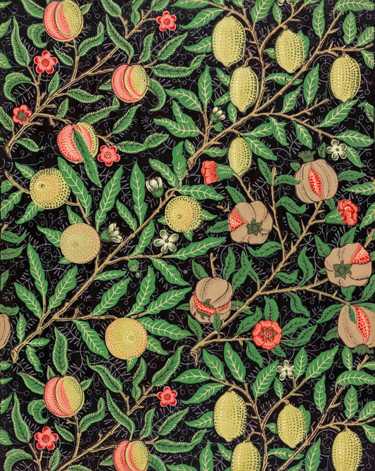 A repeating botanical pattern featuring green leaves, tan and yellow fruits, and small pink flowers on a black background.