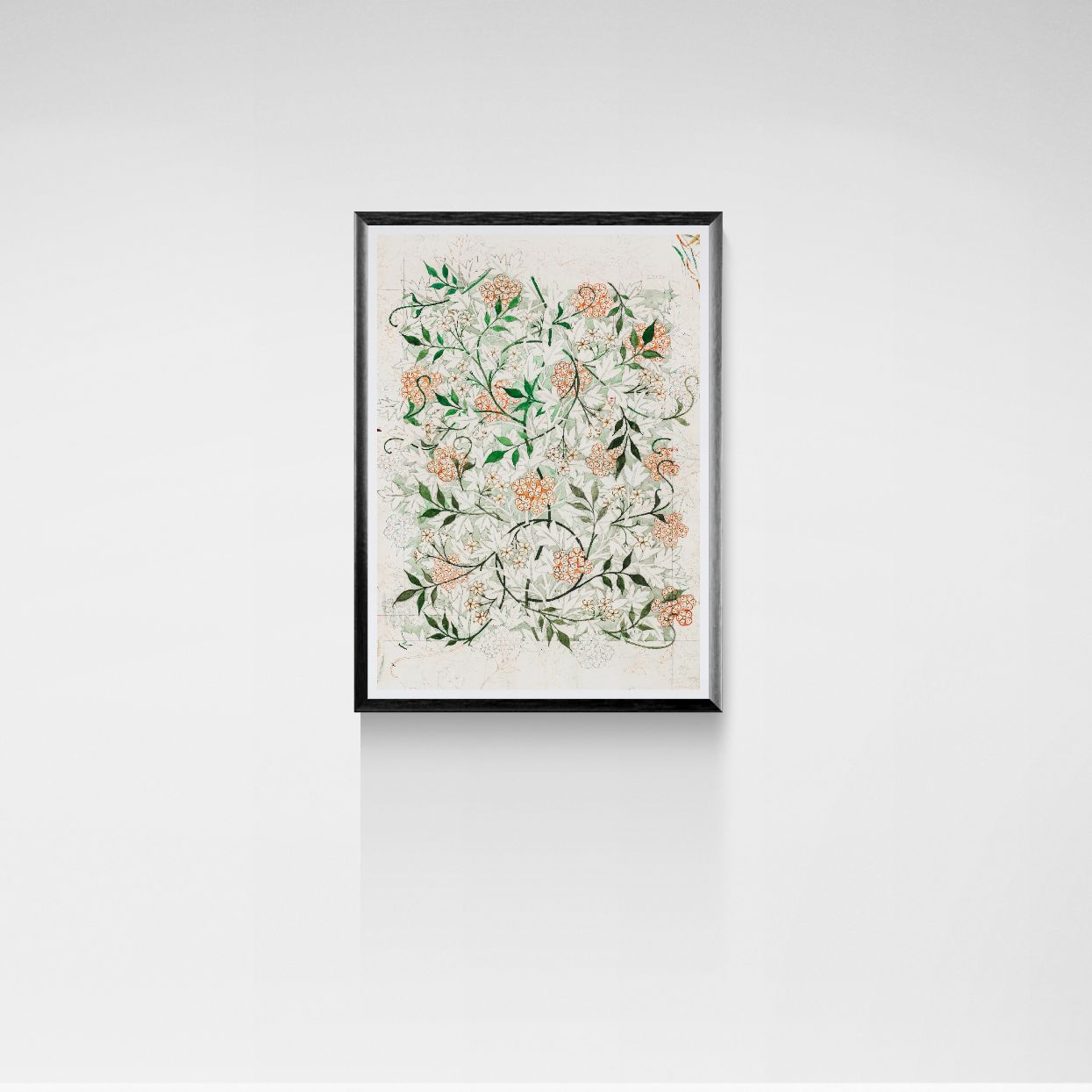 Framed floral artwork on a white wall