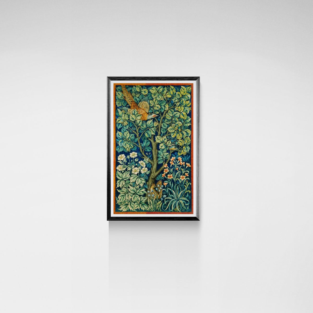 Framed artwork with a floral design on a white wall