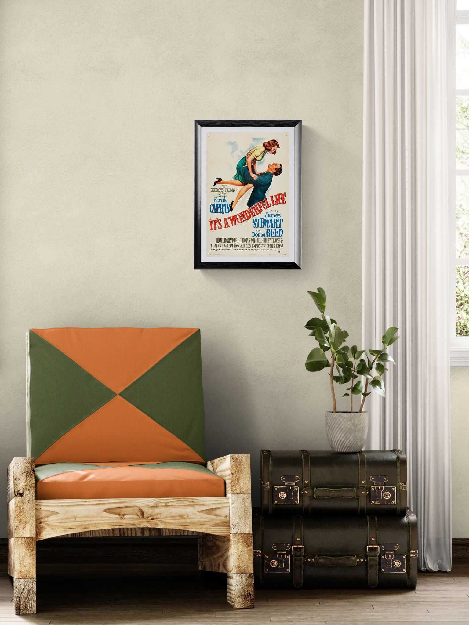 Chair with geometric cushion, framed poster on wall, and vintage suitcase in room.
